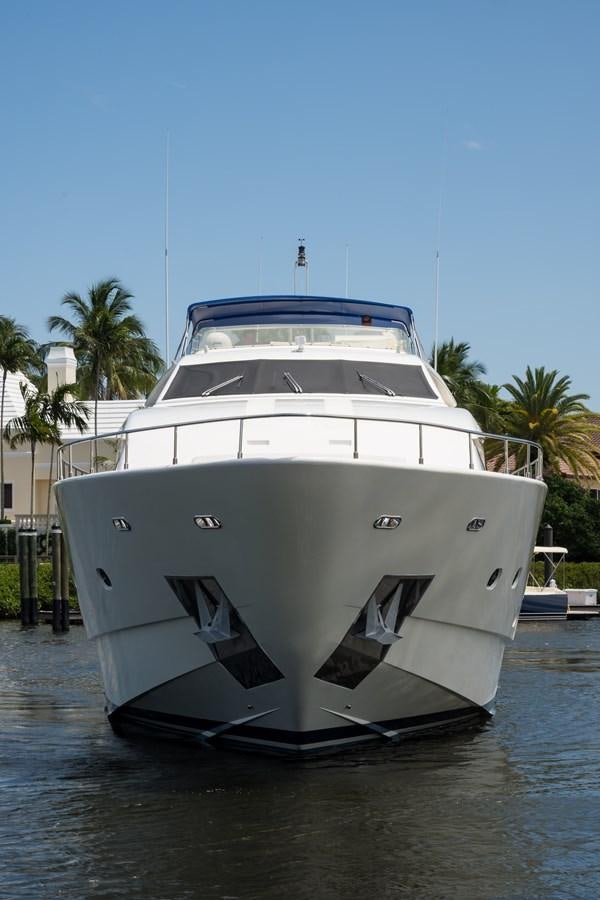 a large white boat in the water aboard TOMORROW WE RIDE Yacht for Sale
