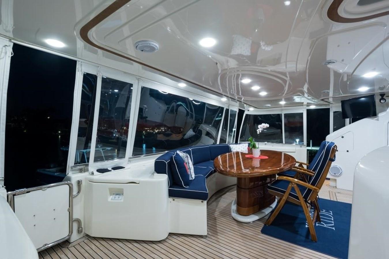 a room with a table and chairs aboard TOMORROW WE RIDE Yacht for Sale