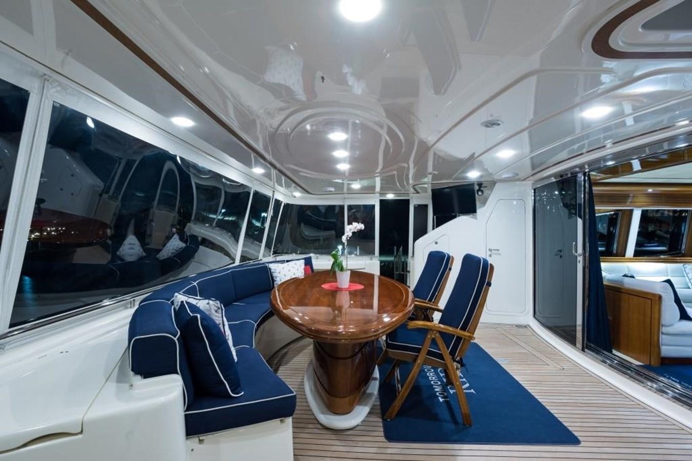 a room with a table and chairs aboard TOMORROW WE RIDE Yacht for Sale
