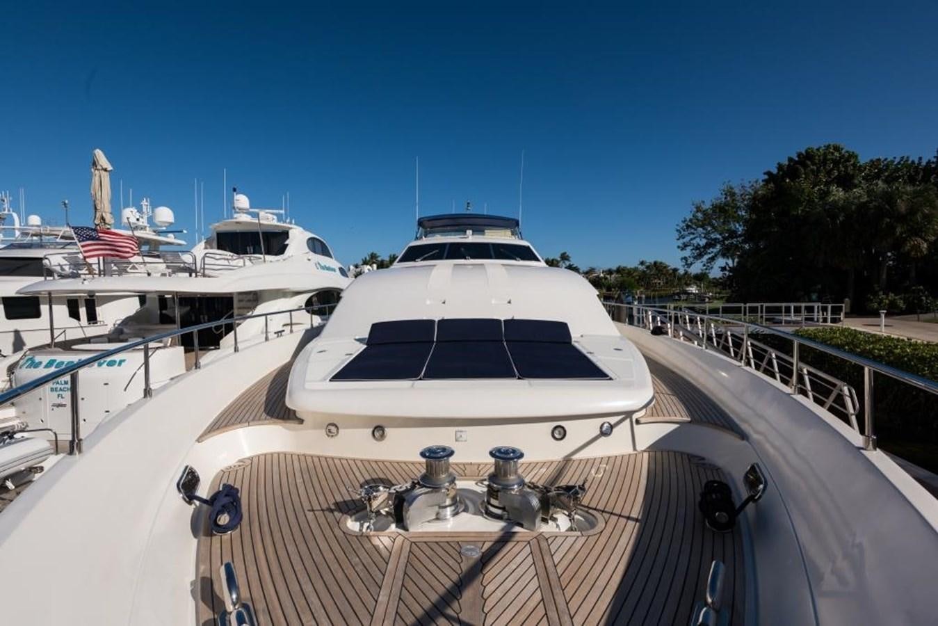 a boat on a deck aboard TOMORROW WE RIDE Yacht for Sale