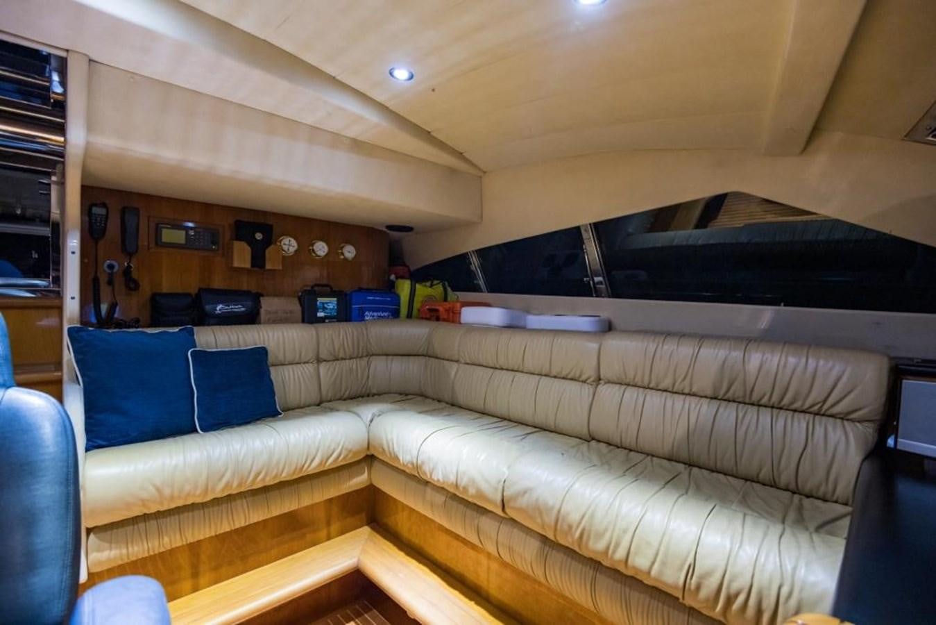 a couch in a room aboard TOMORROW WE RIDE Yacht for Sale