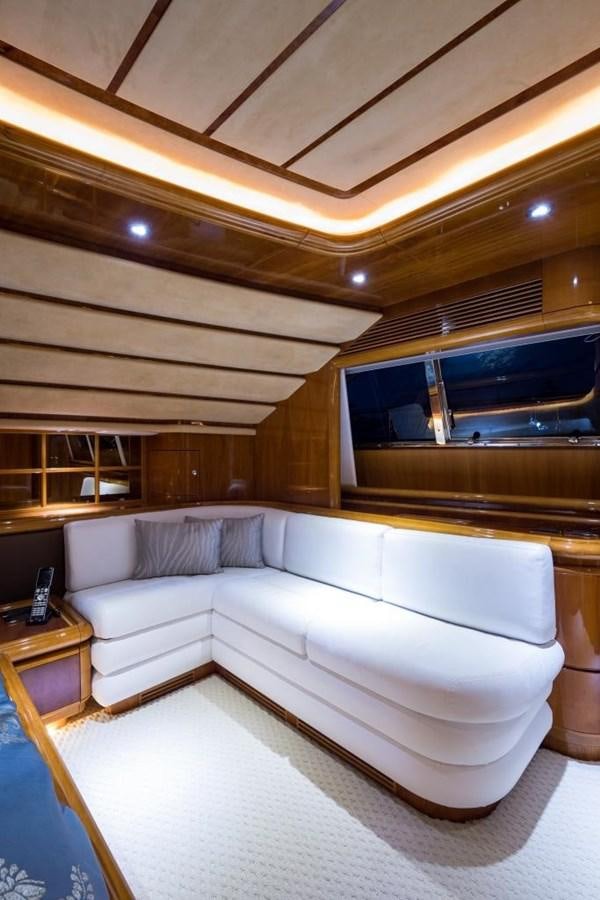 a room with a bed and a window aboard TOMORROW WE RIDE Yacht for Sale