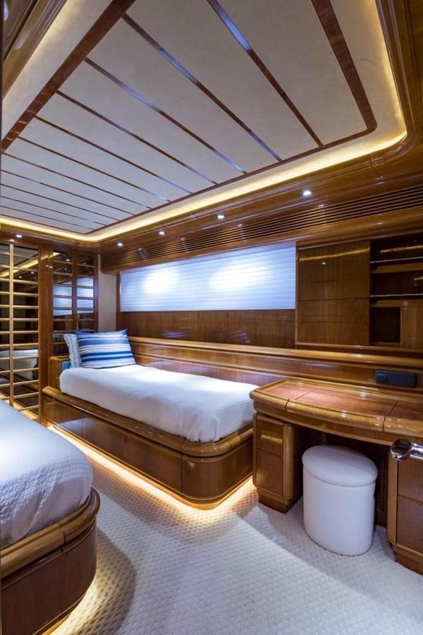 a room with a bed and a mirror aboard TOMORROW WE RIDE Yacht for Sale