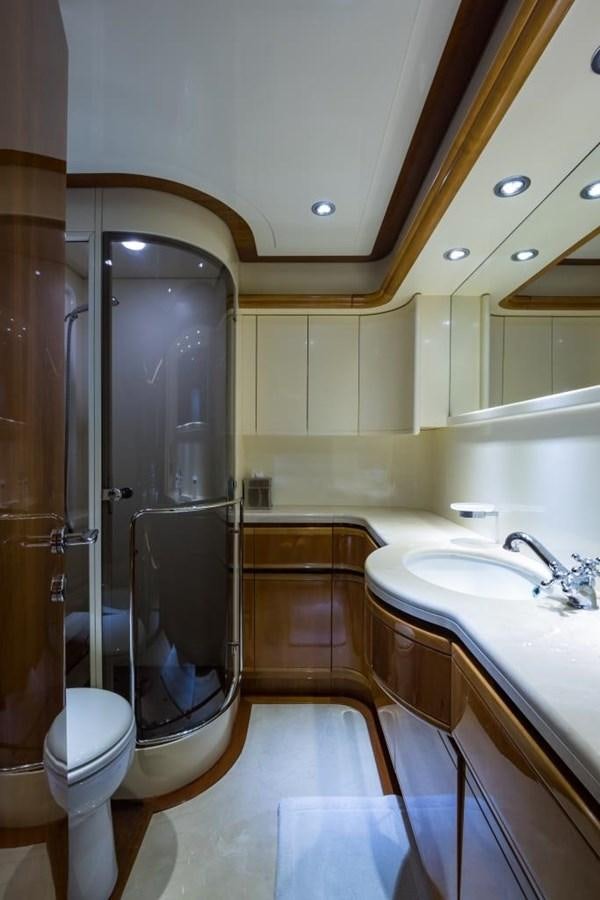 a bathroom with a glass shower aboard TOMORROW WE RIDE Yacht for Sale