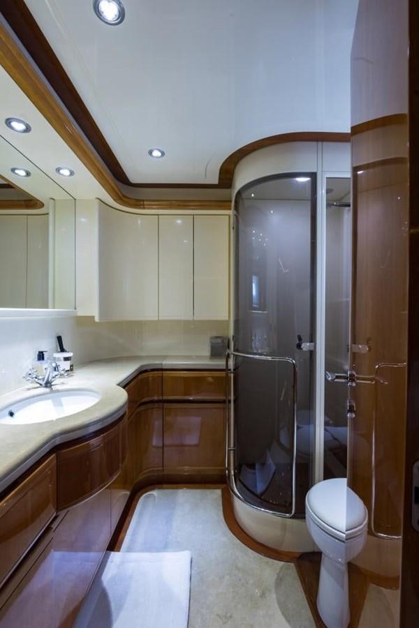 a bathroom with a glass shower aboard TOMORROW WE RIDE Yacht for Sale