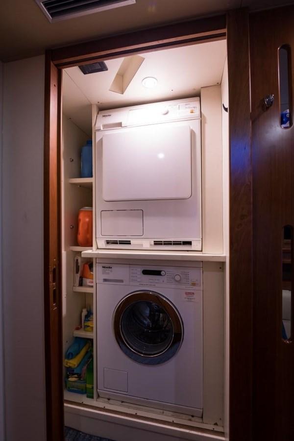 a white washing machine aboard TOMORROW WE RIDE Yacht for Sale