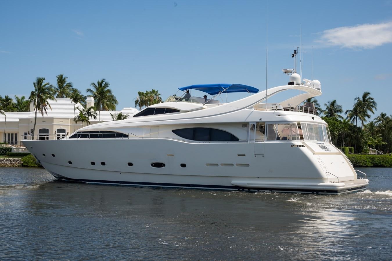 a white yacht on the water aboard TOMORROW WE RIDE Yacht for Sale