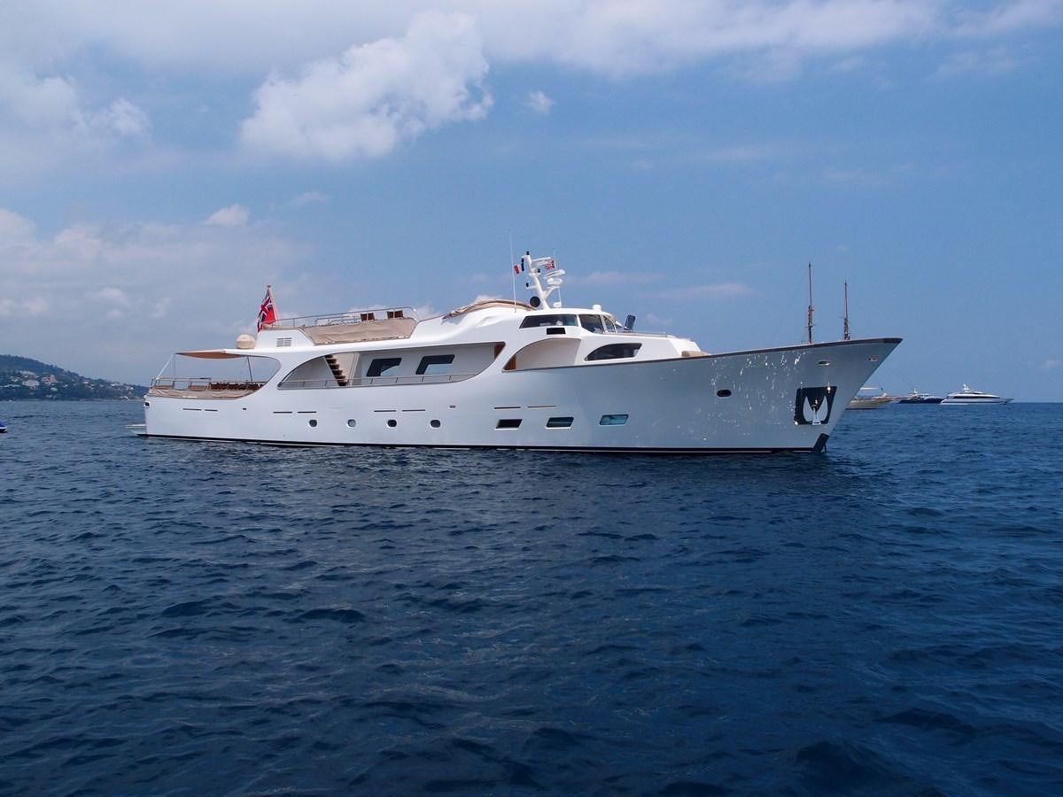 a white yacht in the water aboard CONQUEST OF 1966 Yacht for Sale