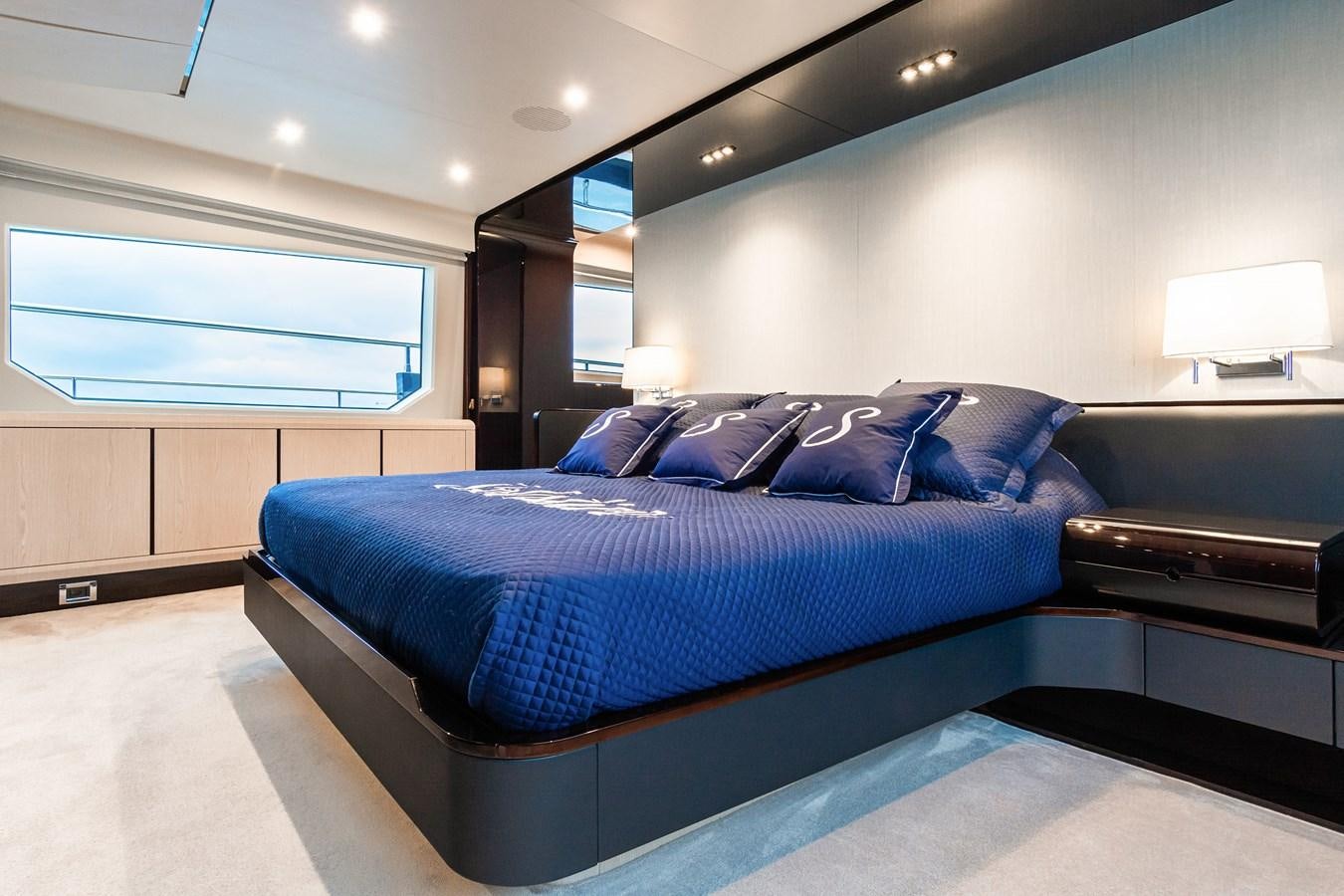 a bed in a room aboard SOLSTICE Yacht for Sale