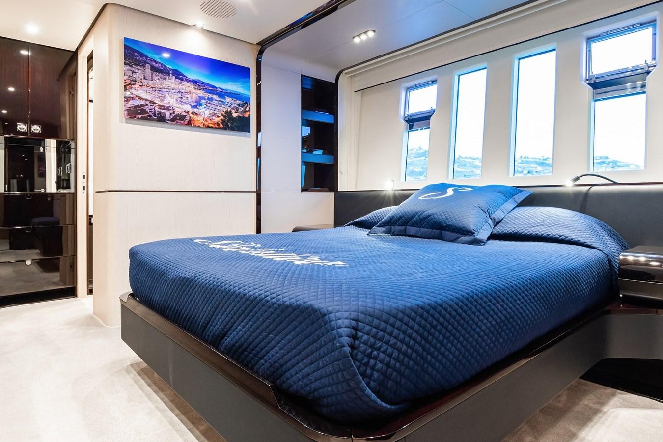 a bed in a room aboard SOLSTICE Yacht for Sale
