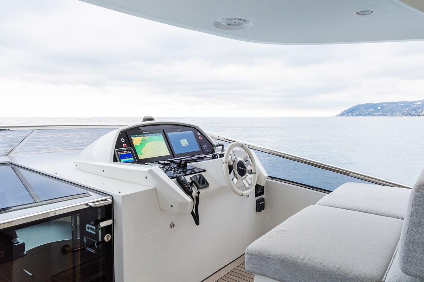 a car driving on a road aboard SOLSTICE Yacht for Sale