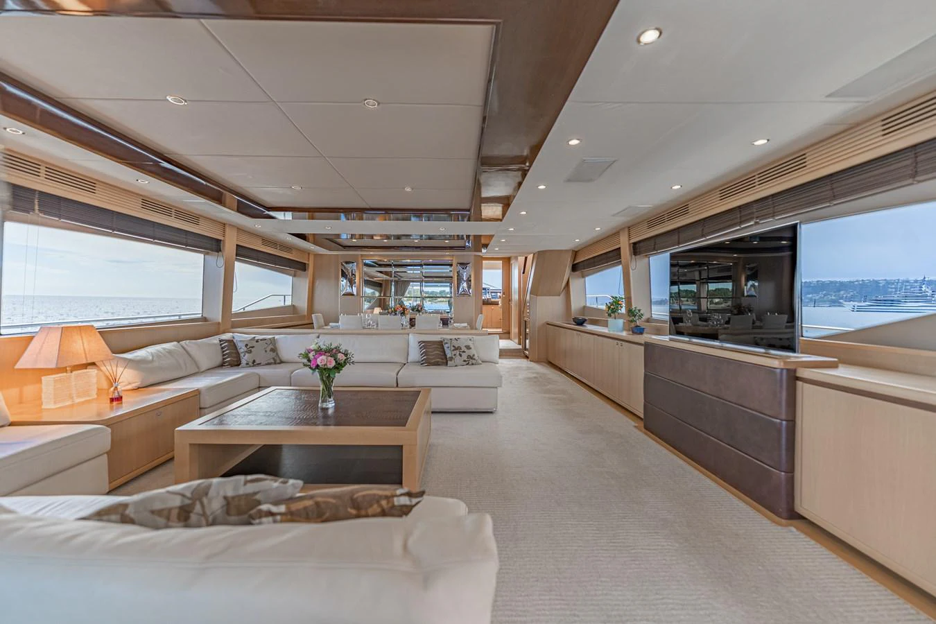 a living room with a large window aboard BLUE EYES Yacht for Sale