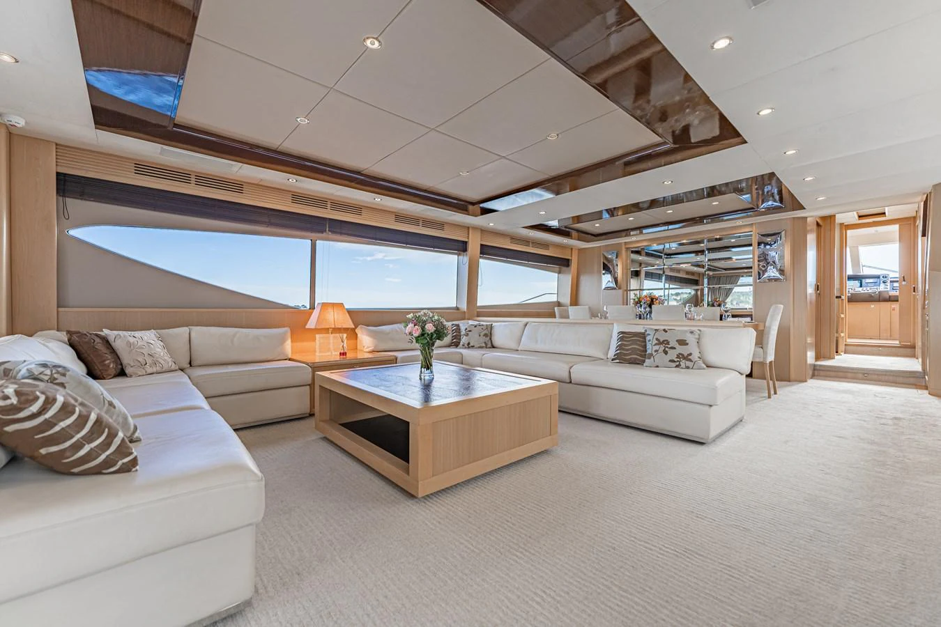 a living room with a large window aboard BLUE EYES Yacht for Sale
