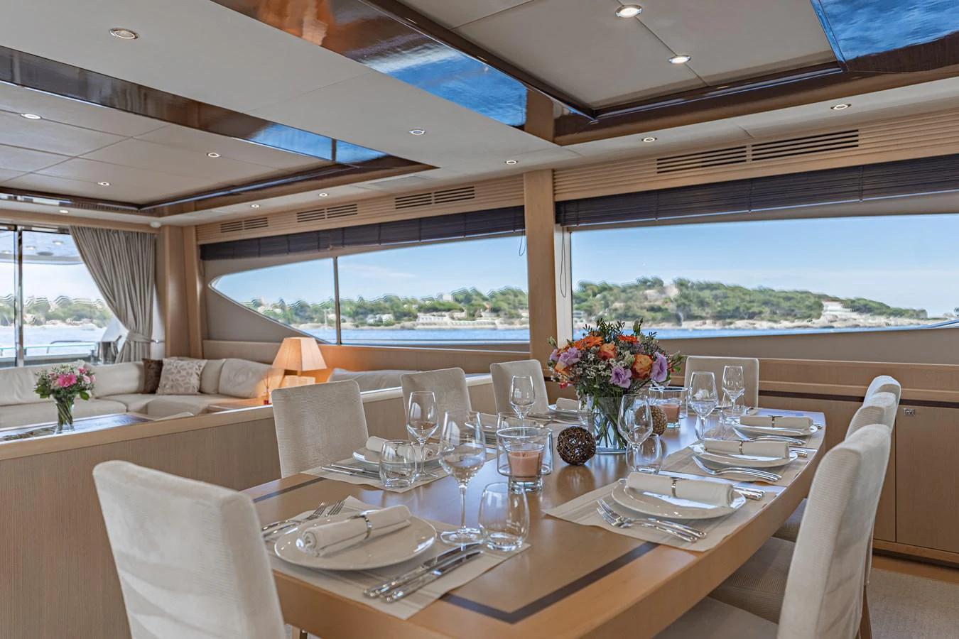 a dining table with wine glasses aboard BLUE EYES Yacht for Sale