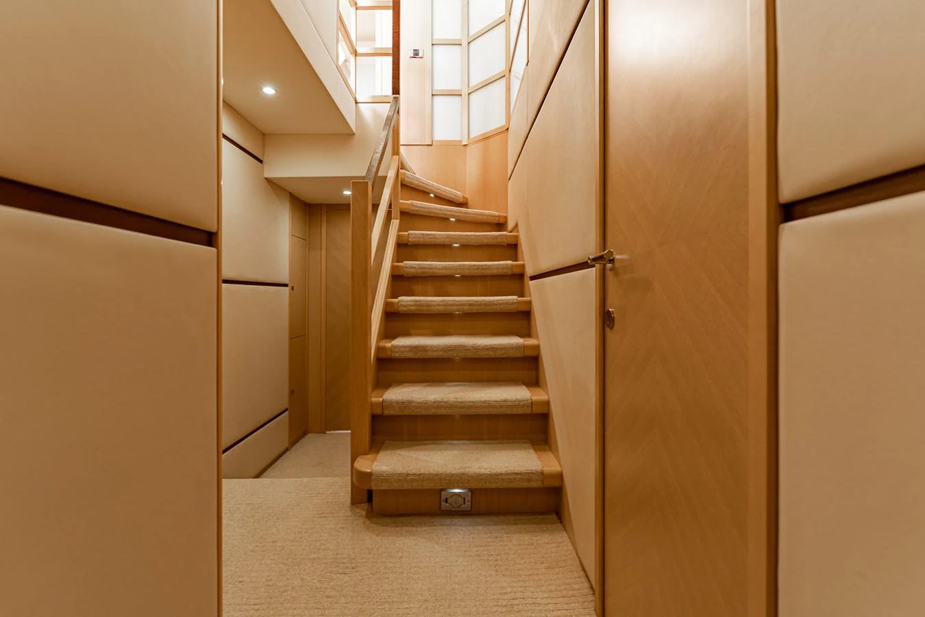 a set of wooden stairs in a building aboard BLUE EYES Yacht for Sale