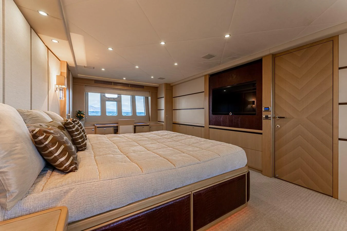 a large bed in a room aboard BLUE EYES Yacht for Sale