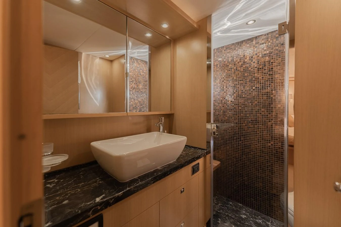 a bathroom with a sink and a shower aboard BLUE EYES Yacht for Sale