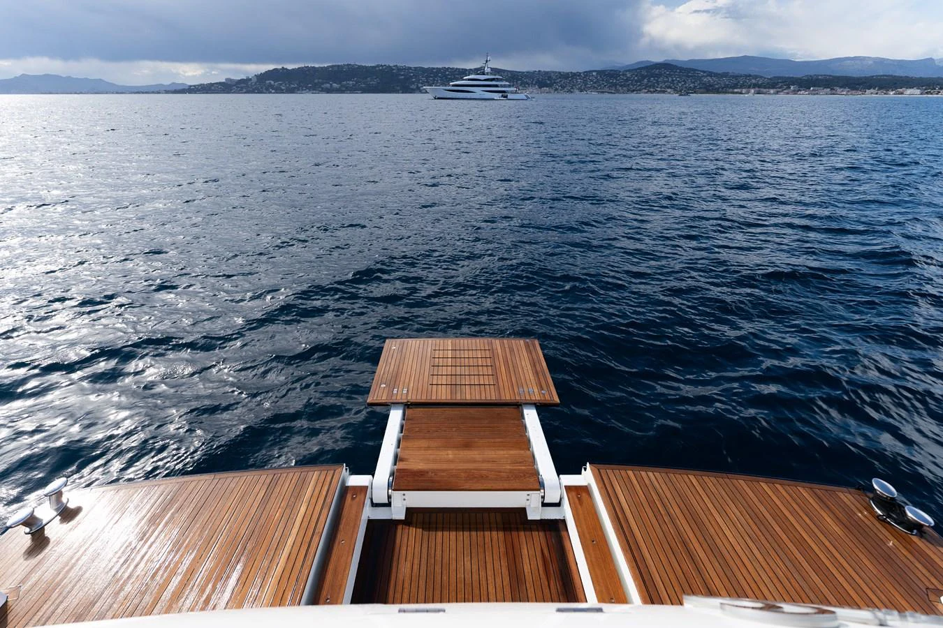 a deck overlooking a large body of water aboard BLUE EYES Yacht for Sale