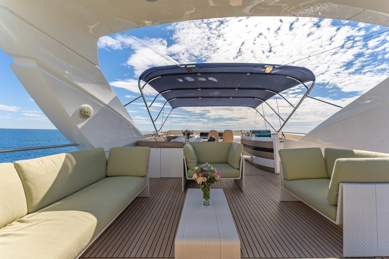 a tent with a table and chairs aboard BLUE EYES Yacht for Sale