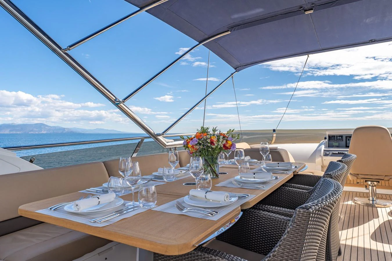 a table set for a dinner aboard BLUE EYES Yacht for Sale