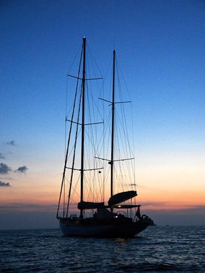 a sailboat in the water aboard AVENTURE Yacht for Sale