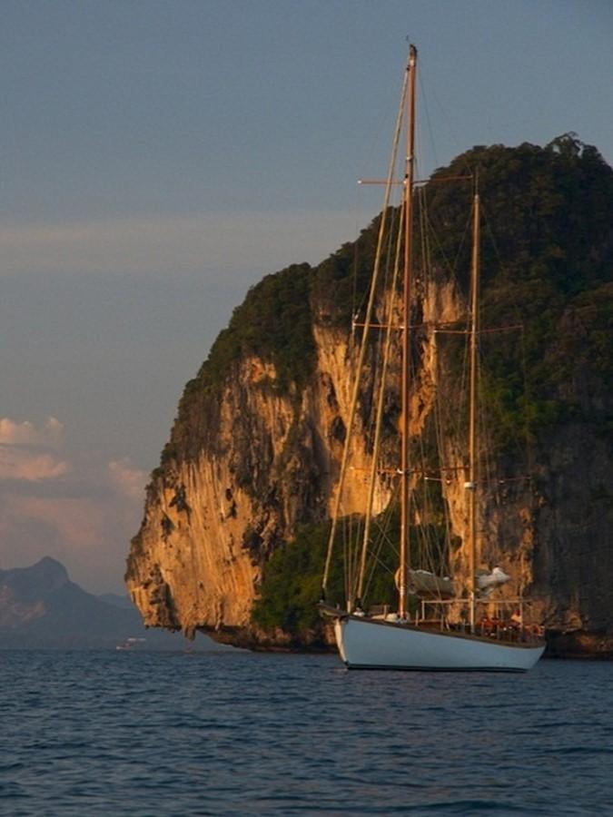 a sailboat in the water aboard AVENTURE Yacht for Sale