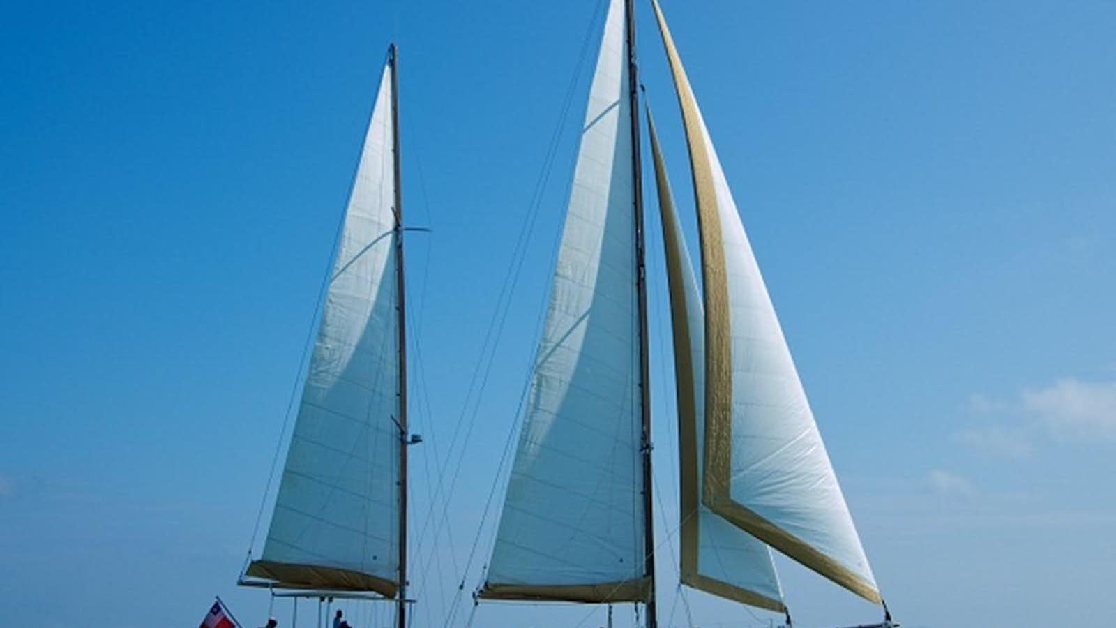 a sailboat on the water aboard AVENTURE Yacht for Sale