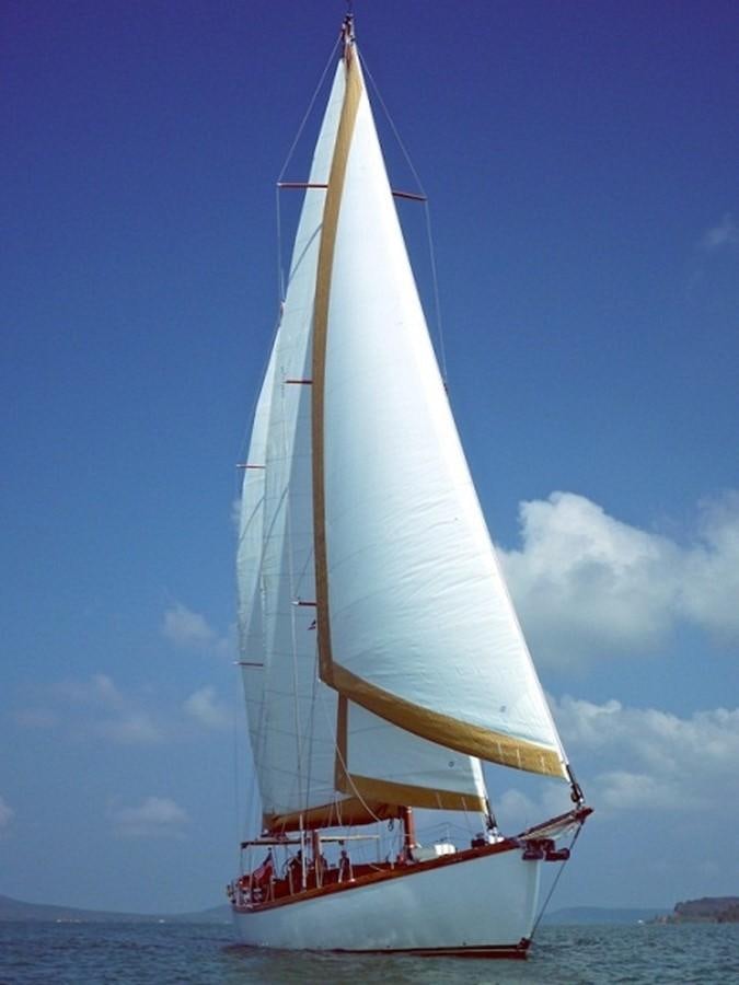 a sailboat on the water aboard AVENTURE Yacht for Sale
