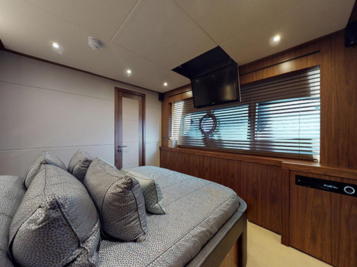 a couch in a room aboard SKI Yacht for Sale