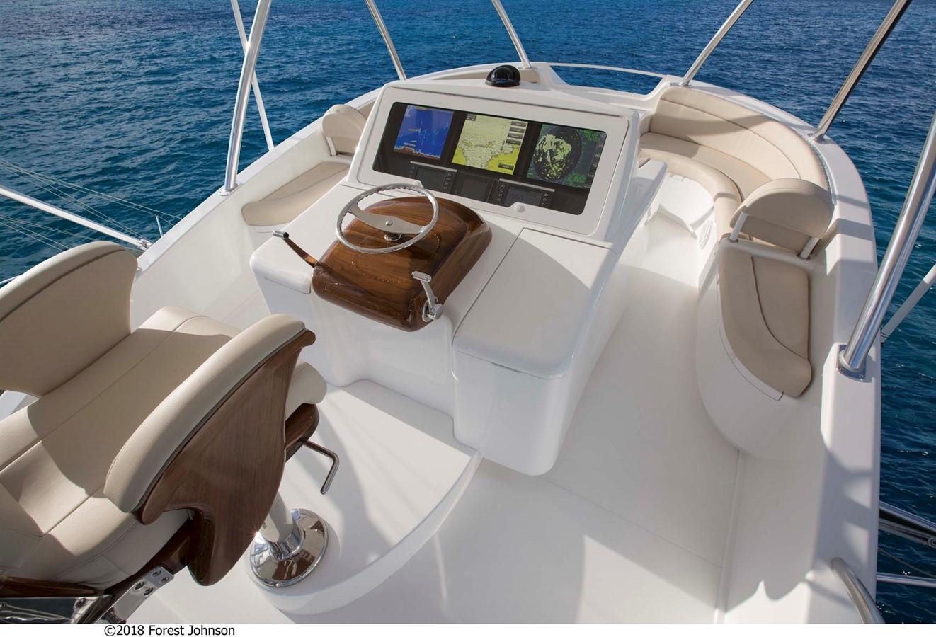 a boat with a seat belt aboard 2022 VIKING 92 ENCLOSED SKYBRIDGE (TBD) Yacht for Sale