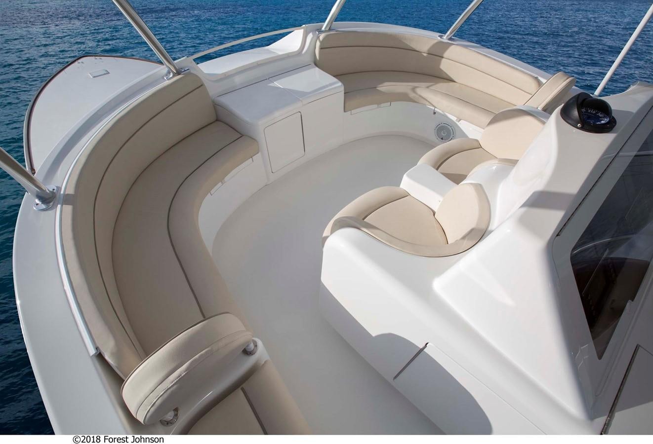 a boat on the water aboard 2022 VIKING 92 ENCLOSED SKYBRIDGE (TBD) Yacht for Sale