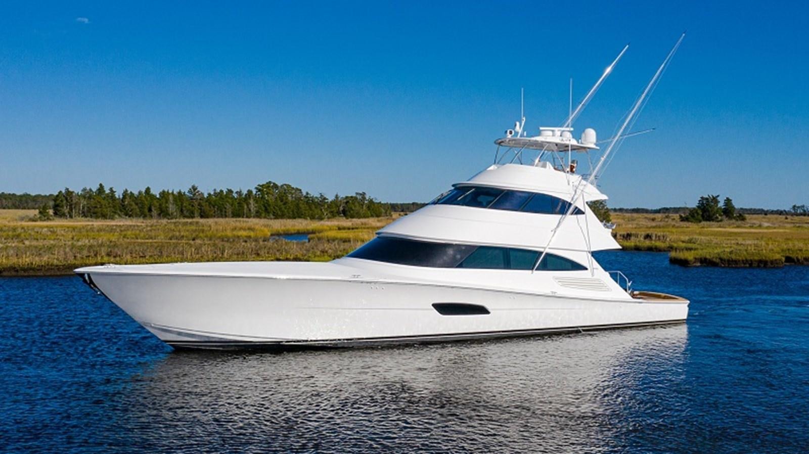 a white yacht on the water aboard 2022 VIKING 92 ENCLOSED SKYBRIDGE (TBD) Yacht for Sale