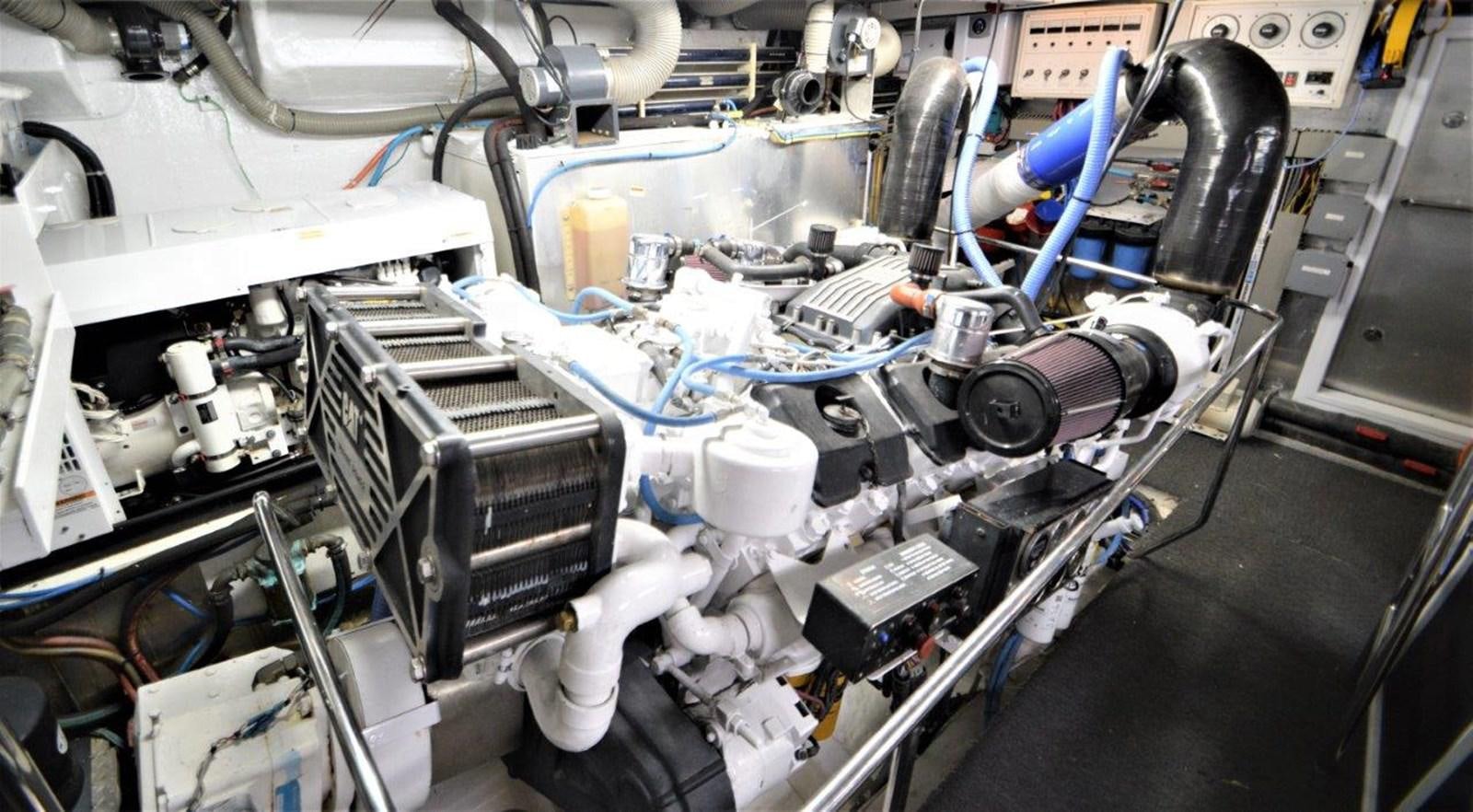 a machine with a large metal cylinder aboard TRIPLE NET Yacht for Sale