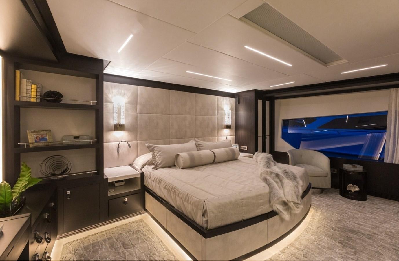 a bedroom with a bed and a tv aboard G-G Yacht for Sale