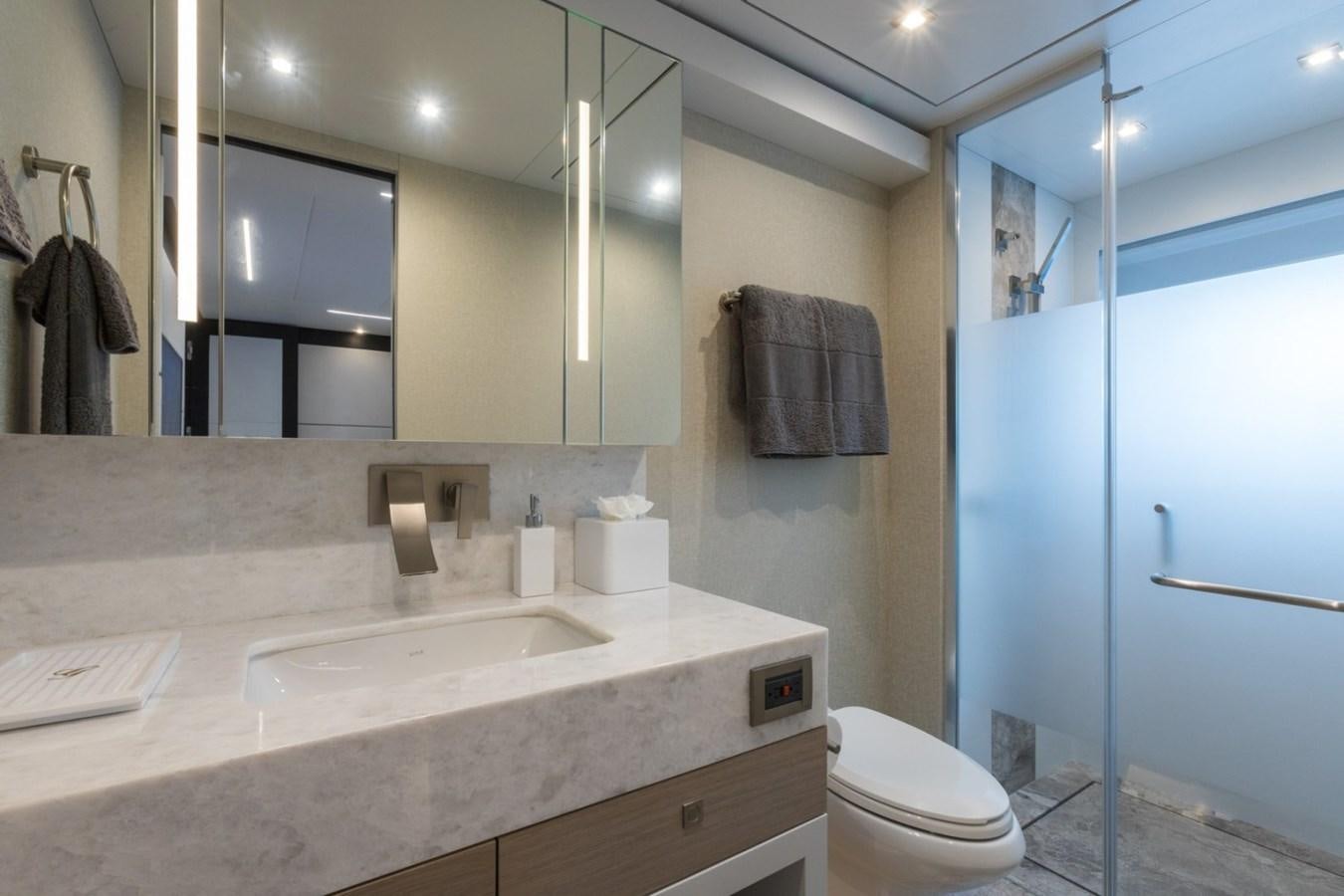 a bathroom with a sink and a mirror aboard G-G Yacht for Sale