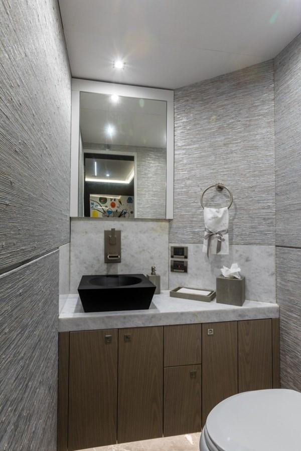 a bathroom with a sink and a toilet aboard G-G Yacht for Sale