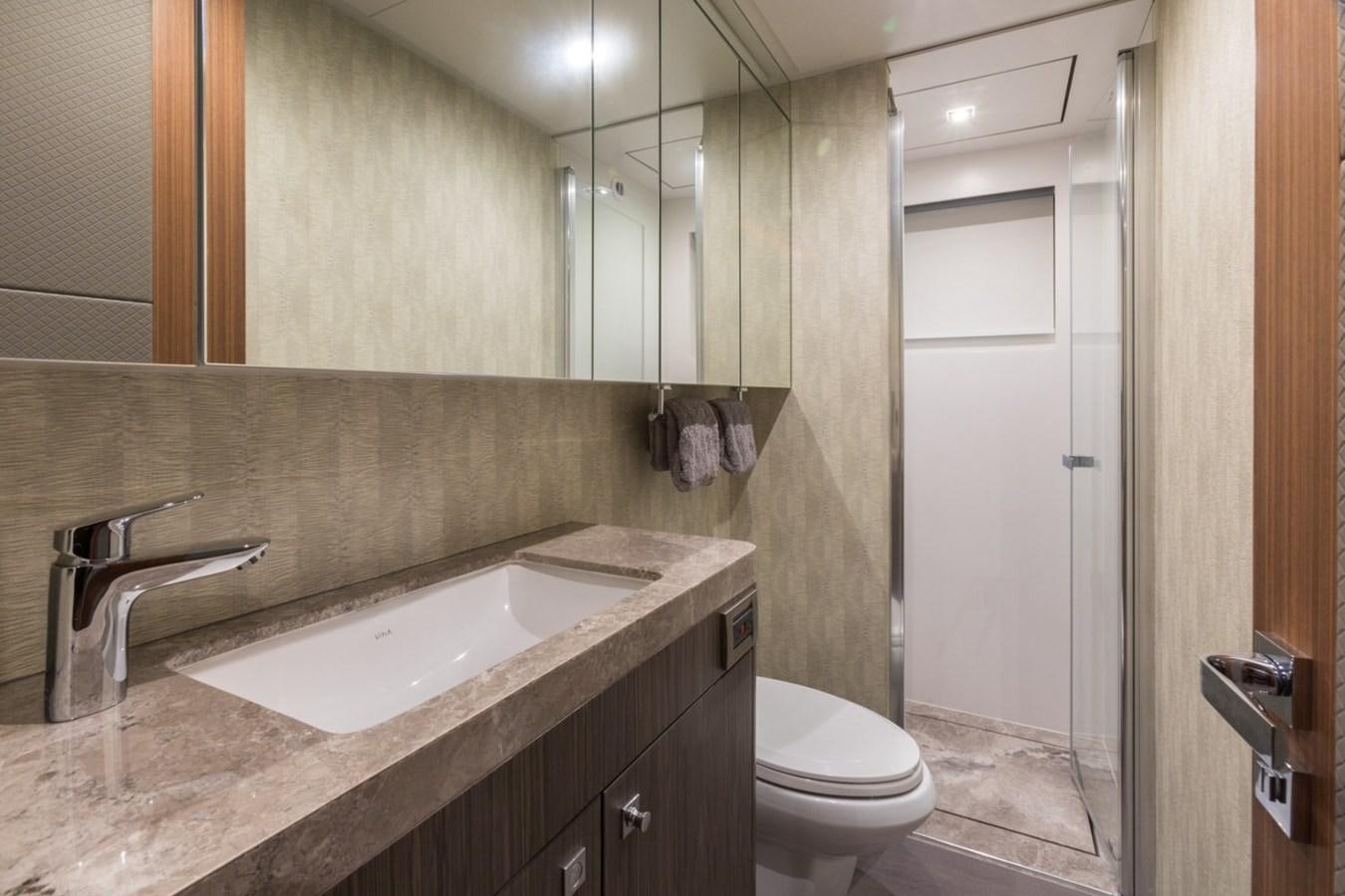 a bathroom with a sink and a toilet aboard G-G Yacht for Sale