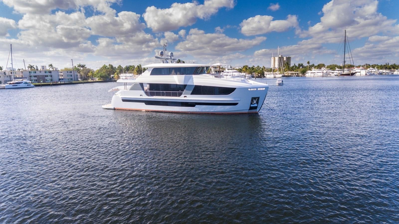 a white boat in the water aboard G-G Yacht for Sale