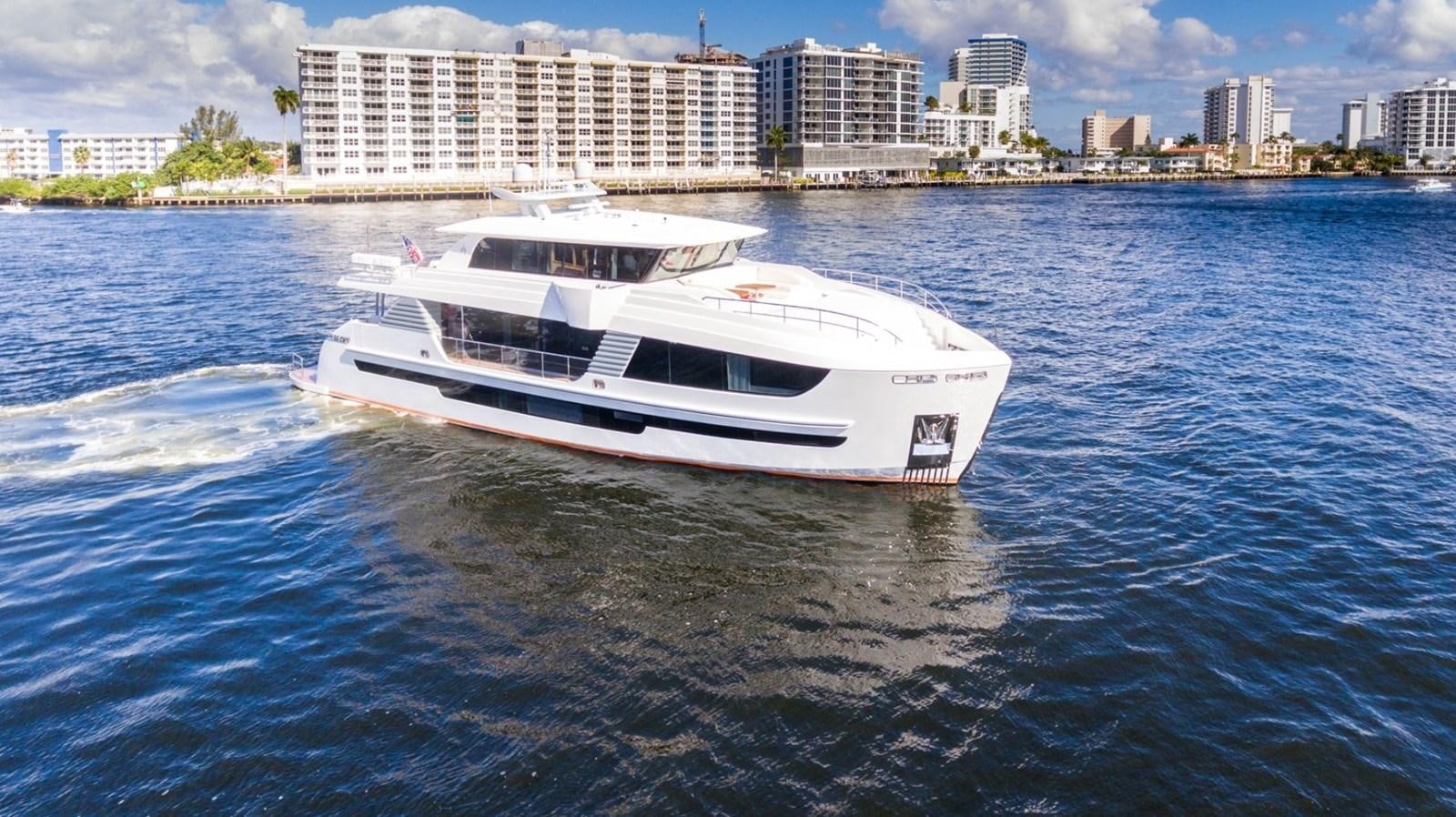 a white boat on water aboard G-G Yacht for Sale