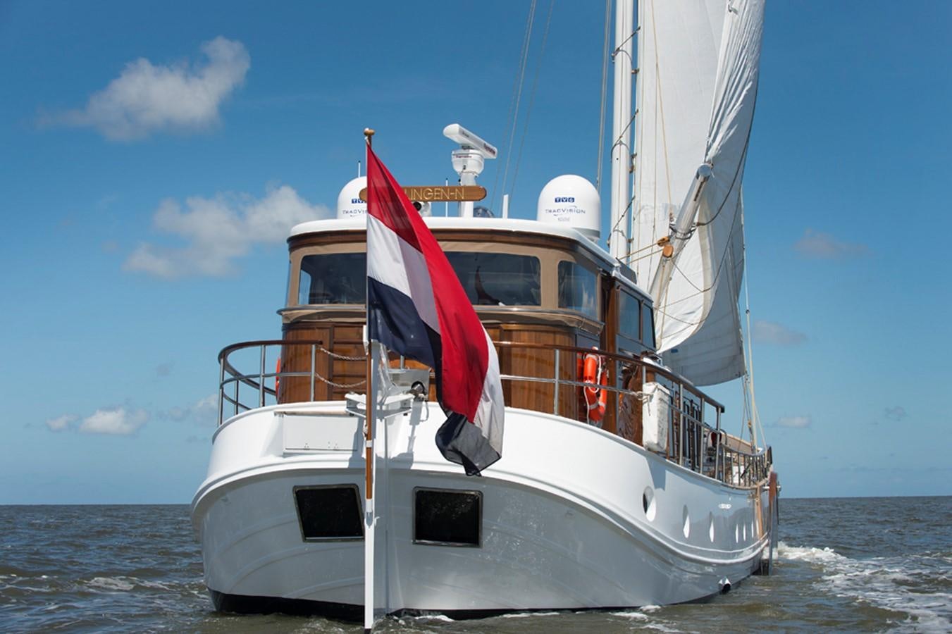 a boat on the water aboard DE VROUWE CHRISTINA Yacht for Sale