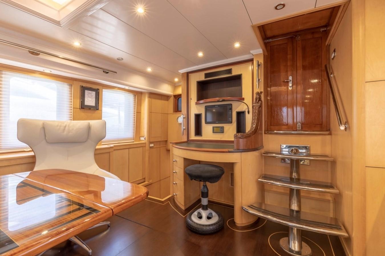 a living room with a couch and a table aboard DE VROUWE CHRISTINA Yacht for Sale