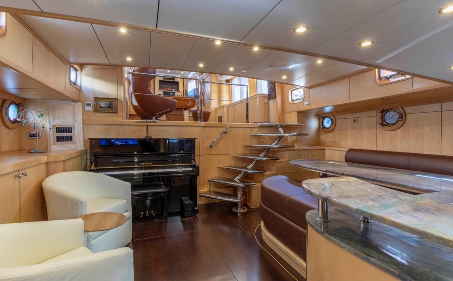 a kitchen with a bar and bar aboard DE VROUWE CHRISTINA Yacht for Sale