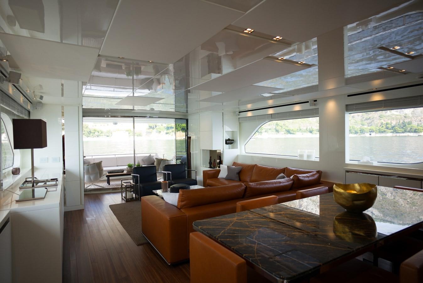 a living room with a large window aboard ELMO Yacht for Sale