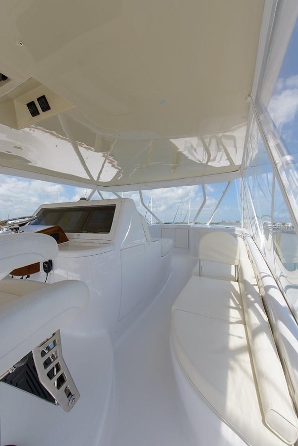 a white room with a large window aboard BANGARANG Yacht for Sale