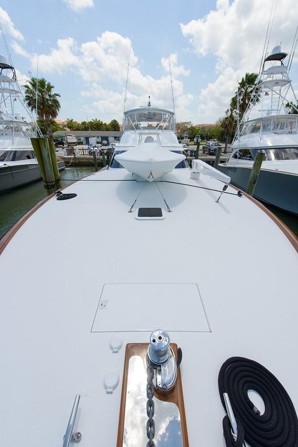 a boat parked at a dock aboard BANGARANG Yacht for Sale