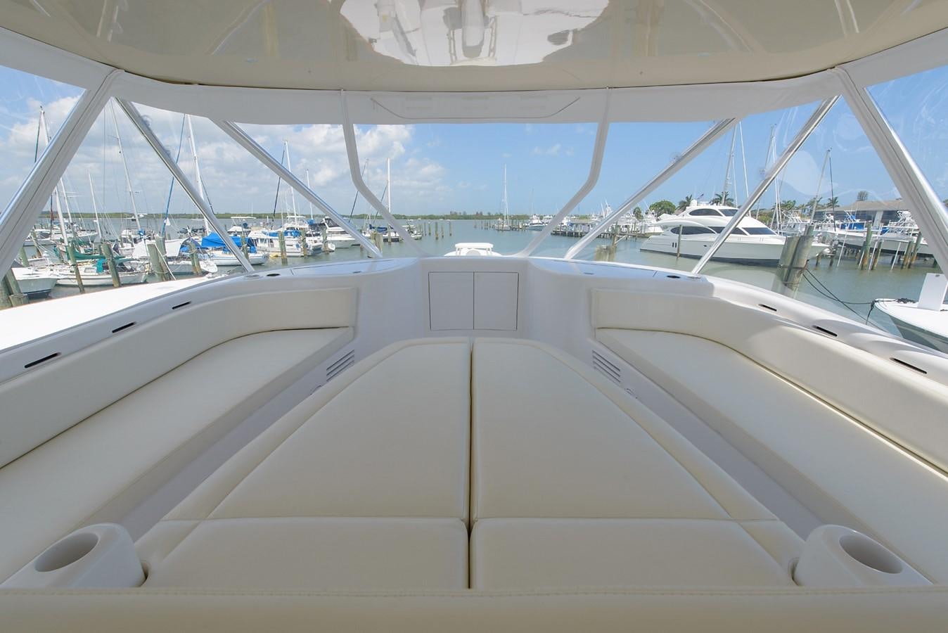 a white boat in a large body of water aboard BANGARANG Yacht for Sale