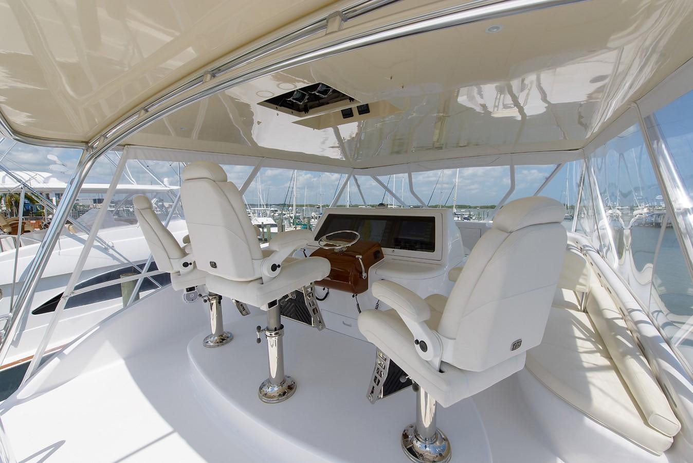 a white chair in a room aboard BANGARANG Yacht for Sale
