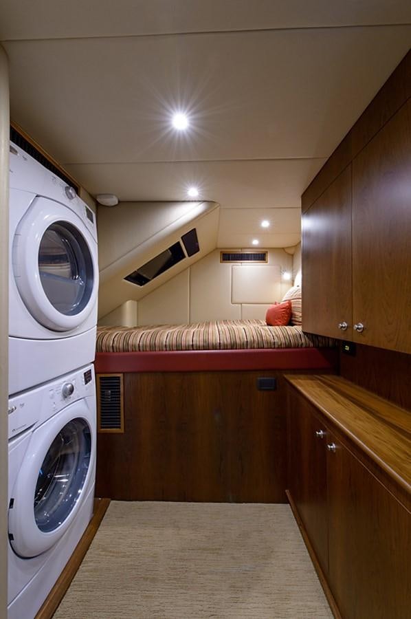 a washer and dryer in a room aboard BANGARANG Yacht for Sale