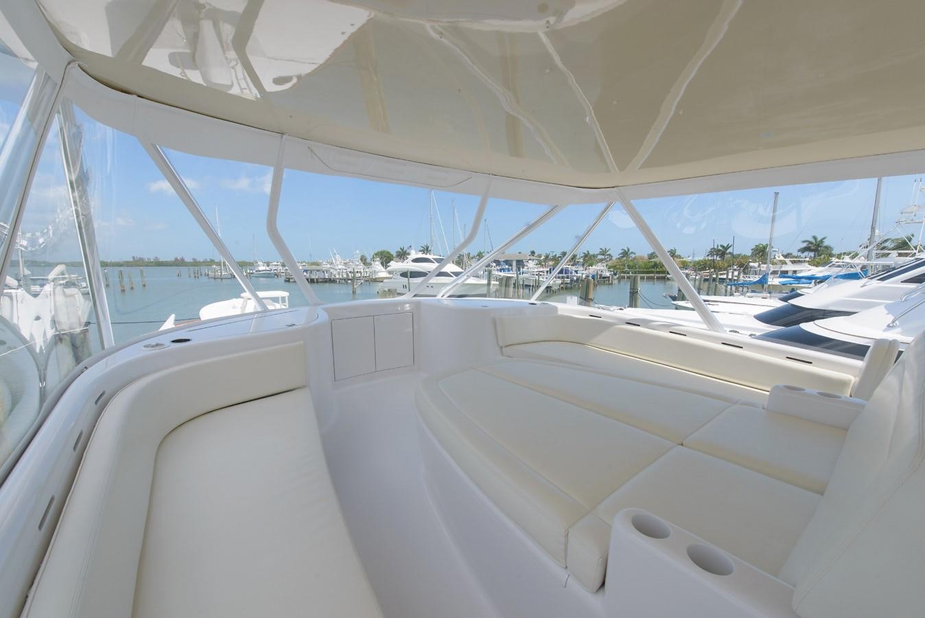 a white boat with a large window aboard BANGARANG Yacht for Sale