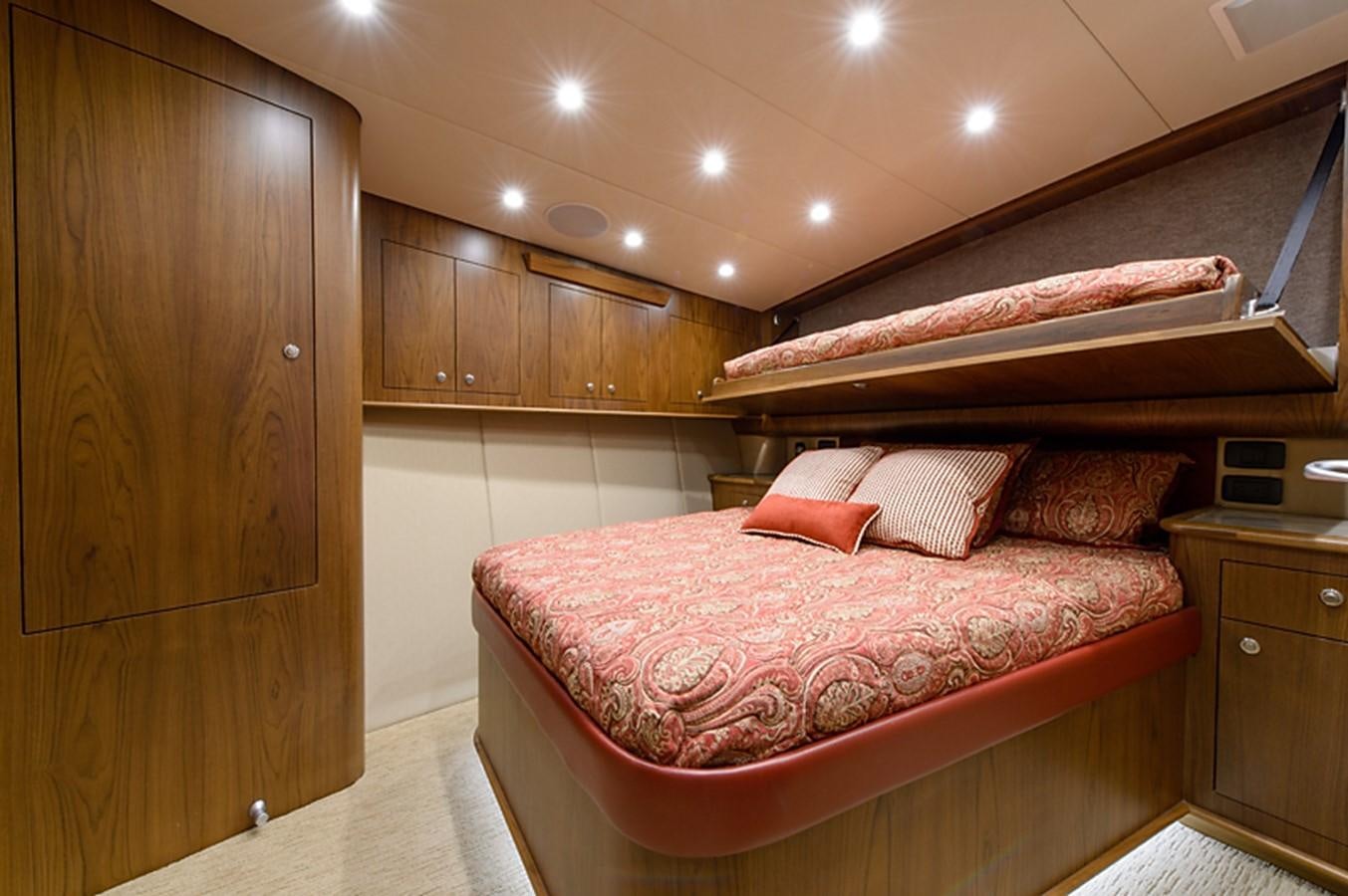a bed in a room aboard BANGARANG Yacht for Sale